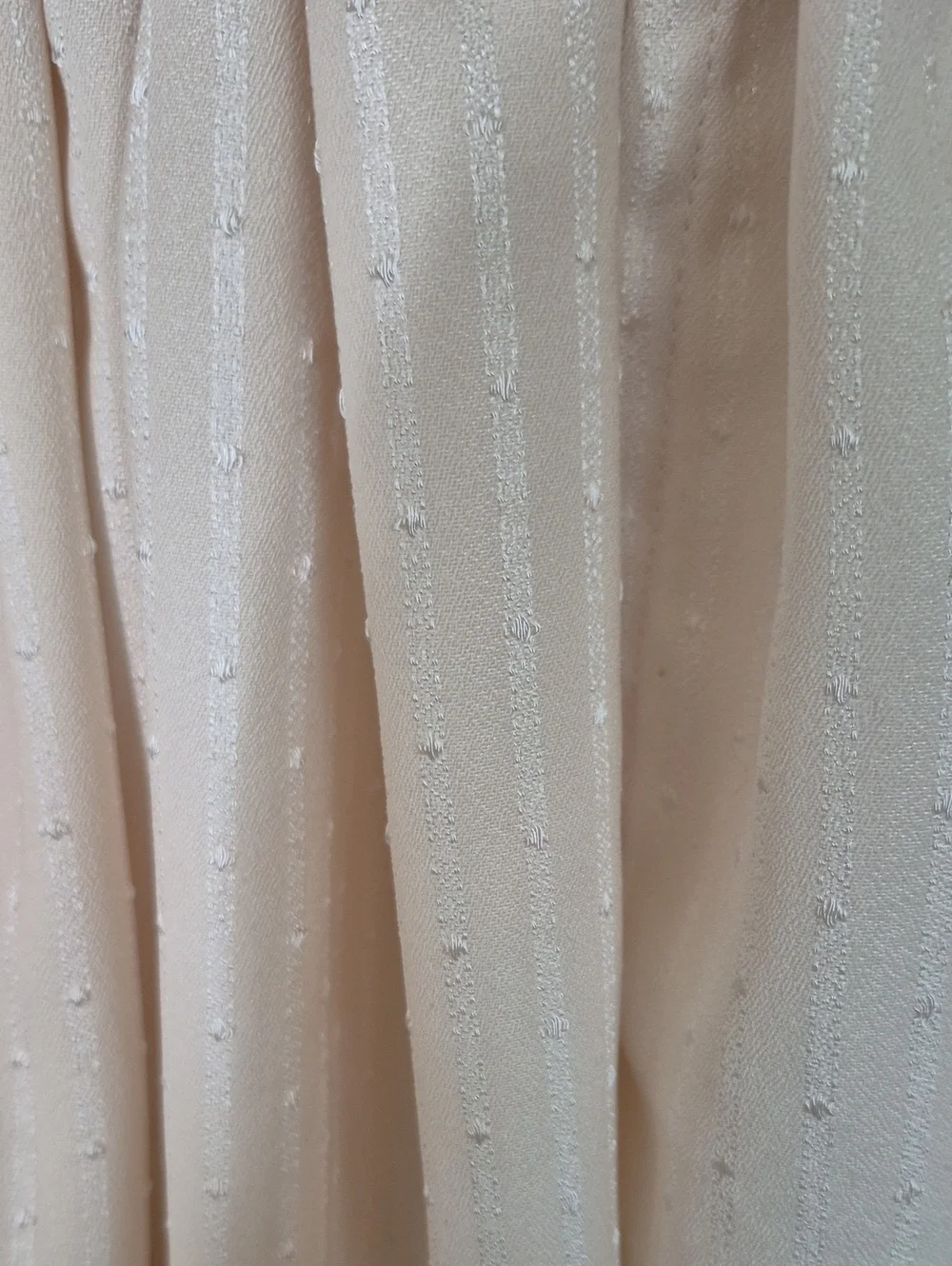 Three Cream Tasseled Curtain Panels
